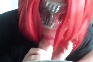 Red haired wench in facial mask giving me deepthroat oral-stimulation