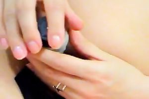 Sassy brunette hair MILF stuff her palatable bald love tunnel with dark pants