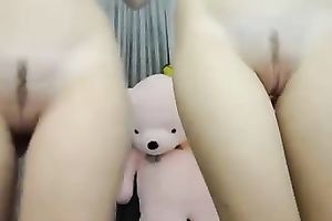 Two teen girls stripping seductively on web camera