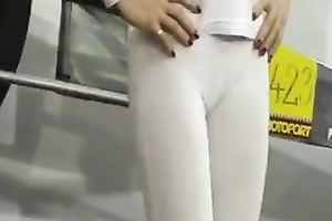 Hot and hawt dark brown cover model in constricted white outfit