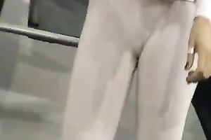 Hot and hawt dark brown cover model in constricted white outfit