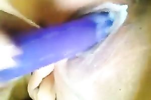 Awesome dark brown bimbo drills her cum-hole with a sex tool