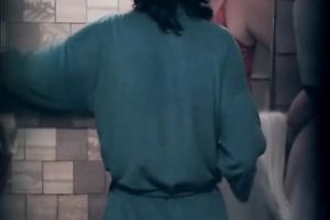 Fat white ladies in the shower room drying after washing