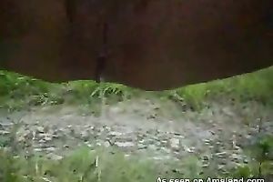 Kinky pair having sex outdoors near the car