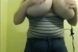 Huge boobed redhead chick playing with her balloons