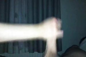 Girlfriend puts a fuck-rubber on my large dick in advance of giving cook jerking