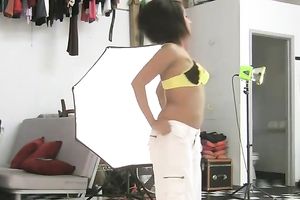 Seductive short haired non-professional Indian brunette hair playgirl positions on camera