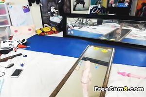 She has exhibitionistic urges and that babe can't live without riding her vibrator against her mirror