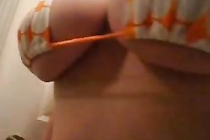 Extremely breasty white women plays with sex-toy lying on the floor