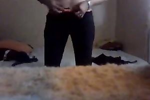 Slender legal age teenager disrobes in front of a web camera and plays with her lovely cum-hole