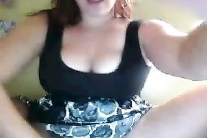 Hot breasty gal rubs her hairless cunny with excitement on cam