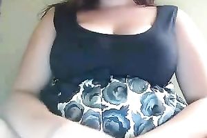 Hot breasty gal rubs her hairless cunny with excitement on cam