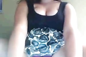 Hot breasty gal rubs her hairless cunny with excitement on cam