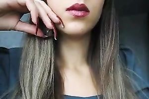 Sexy Married slut with supplementary lengthy nails smokin' seductively on cam