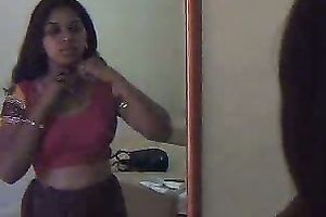 Here is a hot and juvenile Indian hooker dressing up