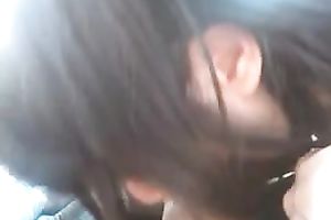 Beautiful Taiwanese coworker chick gives me oral-sex in car