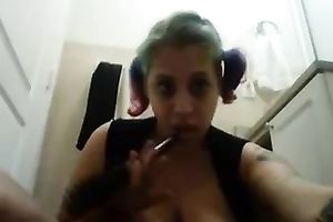 Extremely excited pigtailed dyed haired bitch with excitement masturbated