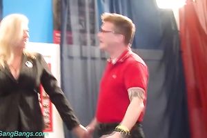 Busty and majestic German milf strips and begins engulfing rods