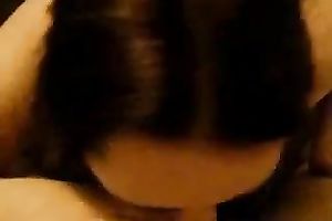 Chubby dark brown sucks and titfucks a dick in POV movie