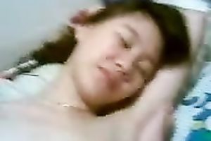 Cute dilettante Asian girlie receives her unshaved bawdy cleft drilled by her BF on livecam