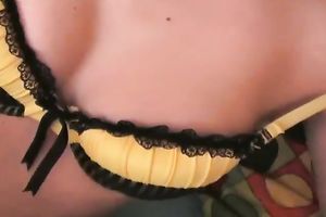 Busty and moist dark brown babe on the daybed pumps her twat with a vibrator