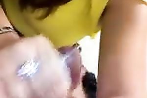 Black haired wifey treats my rod with a tugjob after work