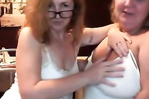 Two lascivious dong loving cougars on web camera flashing zeppelins
