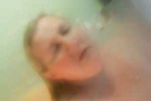 Mature auburn fatso with huge boobs was teasing her own old twat