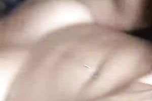 She opens up her legs as this babe lies all naked on bed and rubs her love tunnel