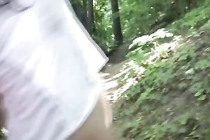 Redhead slut pees in her pants on a bridge in void urine fetish solo