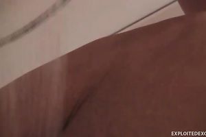 Exclusive brunette hair beauty in the bath showing off her bra buddies