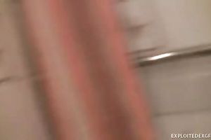 Exclusive brunette hair beauty in the bath showing off her bra buddies