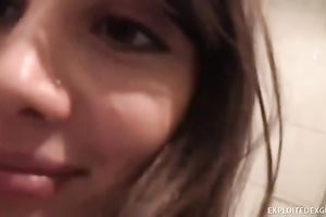 Exclusive brunette hair beauty in the bath showing off her bra buddies