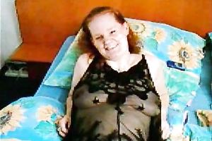 Ginger haired fat housewife joyfully exposes her hairy cunt