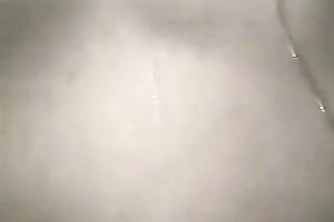 Fat and breasty white hottie taking shower and masturbates