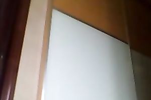 Mature black skin doxy disrobes in front of web camera