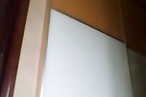 Mature black skin doxy disrobes in front of web camera