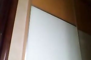 Mature black skin doxy disrobes in front of web camera