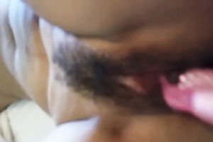 Using a pink bright sex toy lusty girl was petting her bushy muff