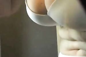 Nice closeup view of my favourite wife's large bazookas in white brassiere