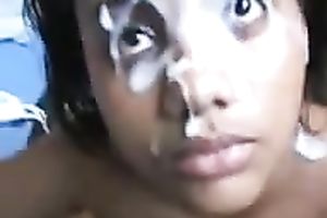 Black girl's gorgeous face is all overspread in manly juice