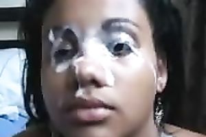 Black girl's gorgeous face is all overspread in manly juice