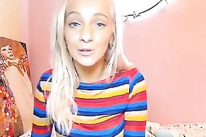 This blue eyed golden-haired temptress knows what to do on cam