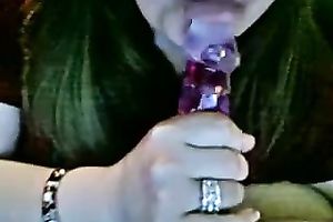 Nerdy non-professional livecam bitch licks a glossy plastic marital-device