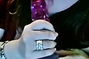 Nerdy non-professional livecam bitch licks a glossy plastic marital-device