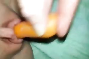 Chubby Australian gf pokes her powerful muff with carrot