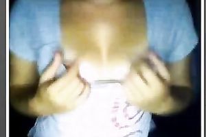 Sunburnt playful sweetie flashes her assets on web camera