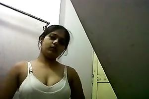 Dark haired dilettante Indian housewife was exposing her taut large love muffins