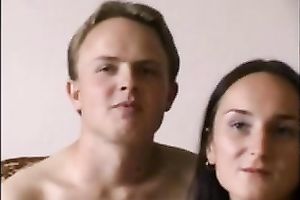 Cute brunette hair sweetie on the bed gives head and rides her boyfriend