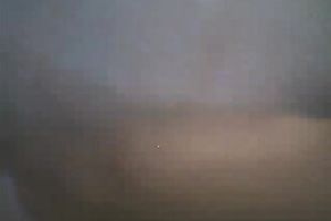 Cute and diminutive exotic webcam model chats in nature's garb with her fans